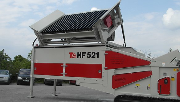 hopper feeder with vibrating grid 