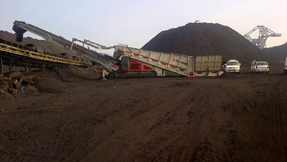 Truck Unloader feeding reclaim line 