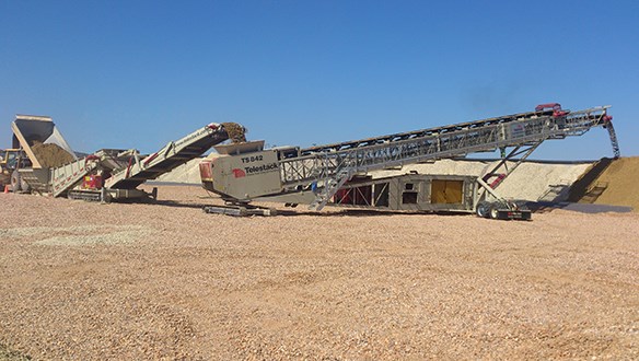 truck unloader and radial telescopic stacker 
