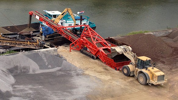 Truck unloader barge loading