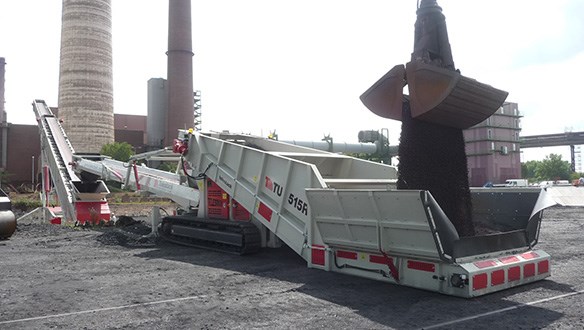 truck unloader fed from grab crane 